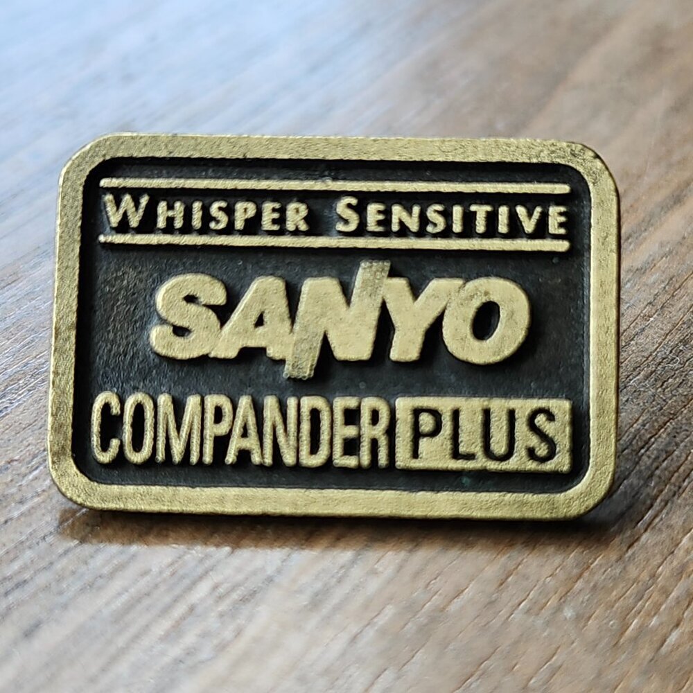 SANYO Compander Plus Whisper Sensitive Enamel Pin